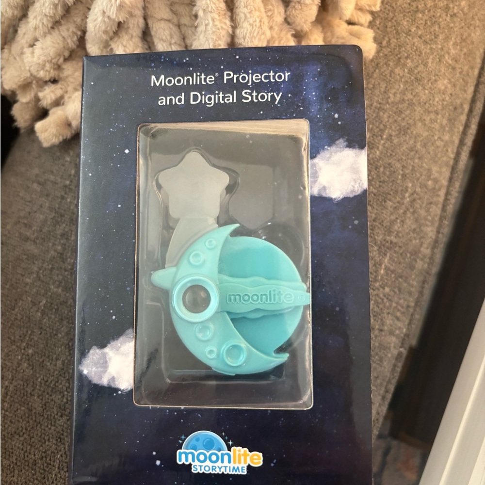 Moonlite story projector- comes with 5 stories